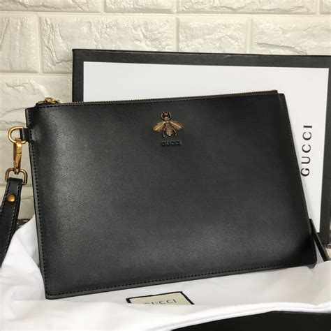 cartera gucci fake